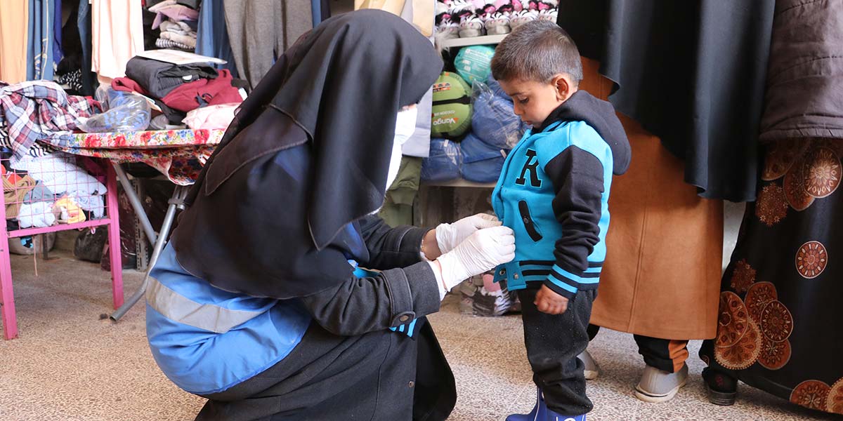 New clothes for a boy in Syria